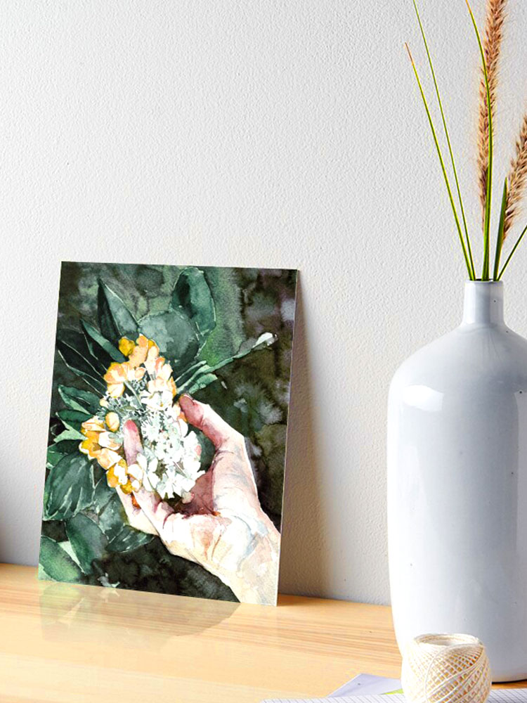 Custom art prints: watercolor painting illustration of a hand holding yellow and greed hydrangea flowers growing outdoors. Perfect for nature lovers. Buy home decor, apparel, accessories and art prints at redbubble.com
